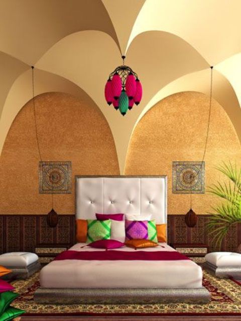 colorful pillows, rugs and artworks plus arched volumes create a proper Moroccan ambience