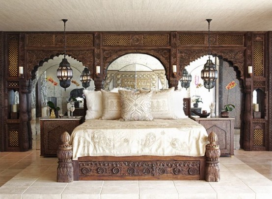 carved wooden panels, a bed and nightstands and Moroccan lanterns for a neutral Eastern room