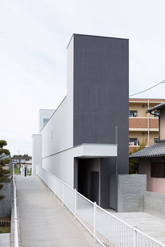 Narrow Urban House With Industrial Minimalist Interiors