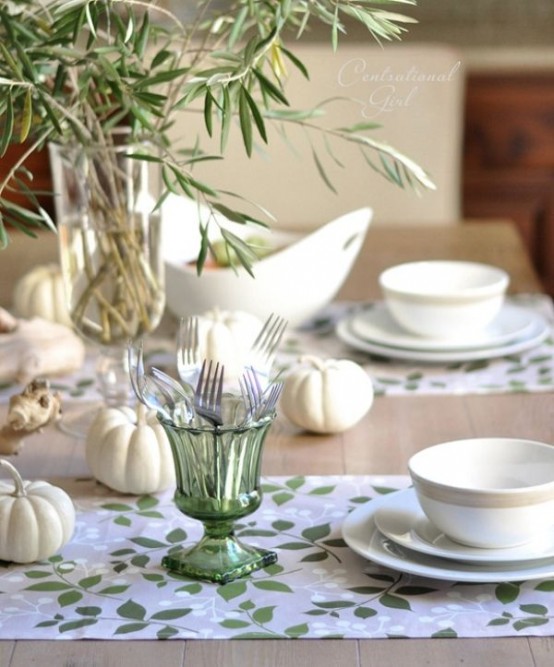 white mini pumpkins and fresh olive branches are great to spruce up your natural and cool Thanksgiving tablescape