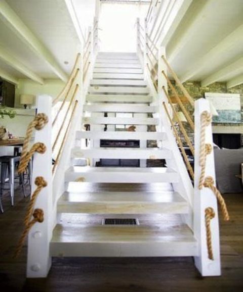 a white beach staircase with rope instead of usual railing is a lovely idea, and that beach effect is achieved with ropes