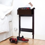 a dark-stained nightstand painted right on the wall, wiht a built-in drawer is a super creative and fun idea for a teenage bedroom, and not only