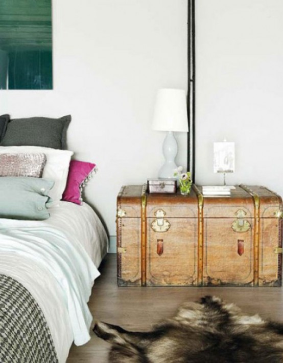 a large vintage chest is a great idea for storage, and it can double as a nightstand giving your bedroom a unique touch