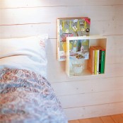 a wall-mounted box as a nightstand is a cool idea for a small bedroom and it allows a bit of storage for you