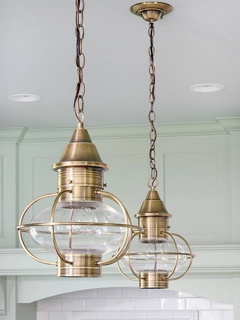 brass pendant lamps with large bubbles and on chain are amazing for a chic and beautiful space with a vintage feel
