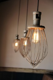 vintage rustic pendant lights like these ones are amazing for a vintage rustic space, not only for kitchens