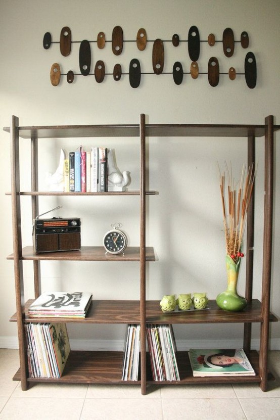 a very simple dark-colored wood bookcase with open shelves will fit most of spaces easily