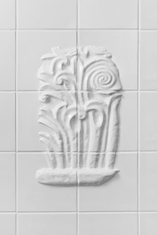 Original White Tiles Exhibiting Archeological Fragments