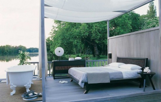 Outdoor Bedroom With A Bathtub