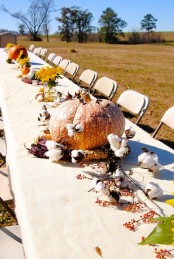 an outdoor tablescape for a thanksgiving party