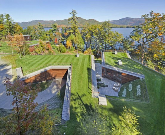 Partially Buried Lake House With Nature Let In