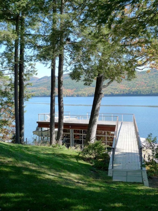Partially Buried Lake House With Nature Let In