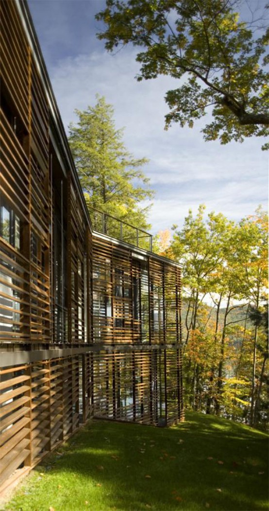 Partially Buried Lake House With Nature Let In