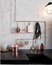 a copper pipe rack for a kitchen is a brilliant idea – you get a pretty and functional holder for your kitchen and a lovely industrial touch