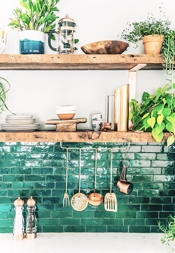 a brick backsplash painted green is a catchy and bold idea for a modern kitchen, it adds color and interest to the space