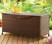 a wicker bench and chest in one is a timeless way to get storage and bring an relaxed feel at once