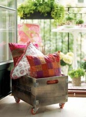 a crate on casters is great for storing pillows and other accessories and can be used anywhere