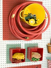 a pegboard with hooks and other items to hang and attach some units you need to use
