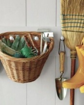 several hooks attached to the wall will allow you to hang a basket, some tools and other stuff you want