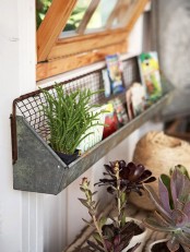a simple old metal shelf attached to the wall may accommodate some stuff you often use