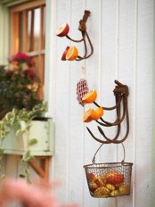 large metal hooks attached to the wall will allow storing various stuff and though they don’t look very neat, they are practical