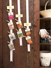 paper strips can be used to attach some seeds packages with clothespins