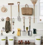 simple hook strips on the wall will be a nice organization idea for a shed, hang whatever you like including whole storage units