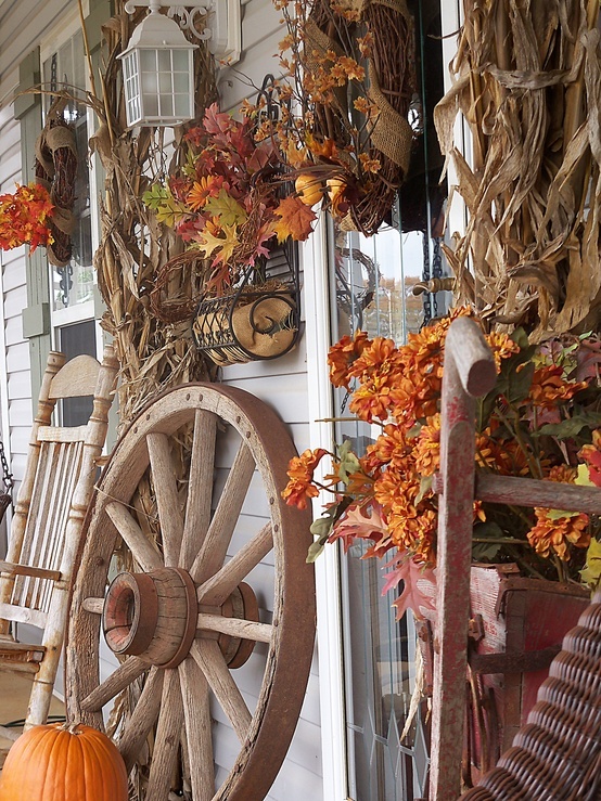 A wagon wheel would add a pretty rustic touch to any fall arrangement.