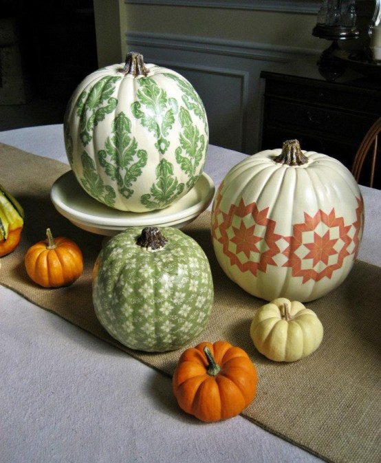 stenciled bright pumpkins are great for the fall, and such a DIY is very easy to make yourself