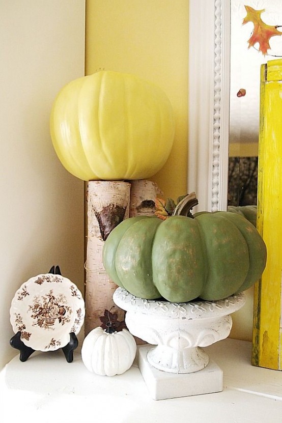 natural pumpkins painted in bright colors are lovely for decorating for the fall, enjoy super bright shades