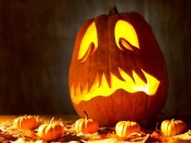 a scary carved Halloween jack-o-lantern is a creative idea for Halloween home decor and can be used outdoors, too