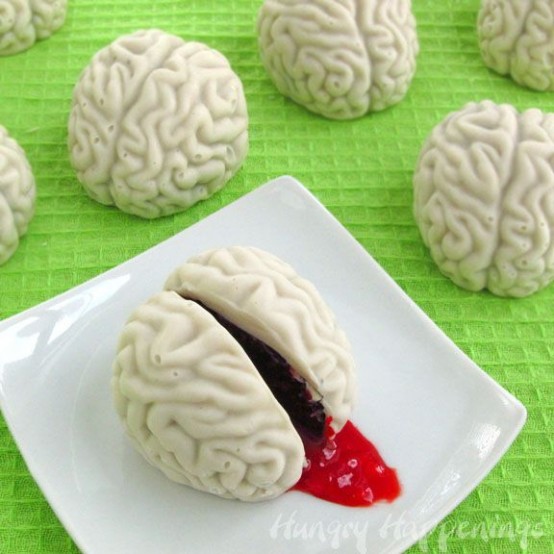 white Halloween sweets styled as brains, with blood inside are scary and stylish sweets for your white party