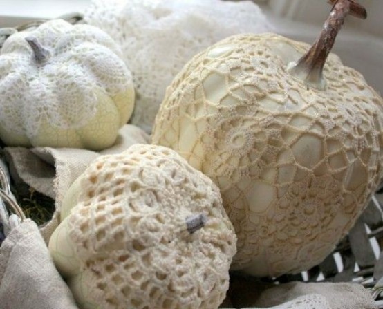 white pumpkins covered with lace are chic decorations for fall or Halloween and will do for Thanksgiving, too