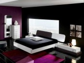 a contrasting black, white and purple bedroom with a window, black and white furniture, a mirror and a view