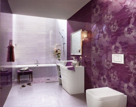 a purple and lavender bathroom with florla patterned tiles, sculptural details and a skylight