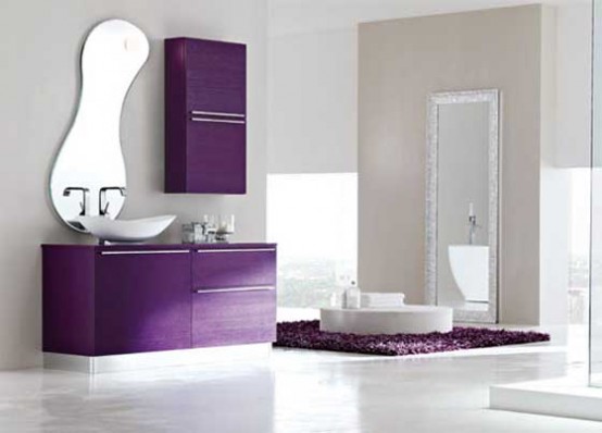 a purple and off-white bathroom with clean lines and shapes, a catchy shaped mirror and a floating vanity