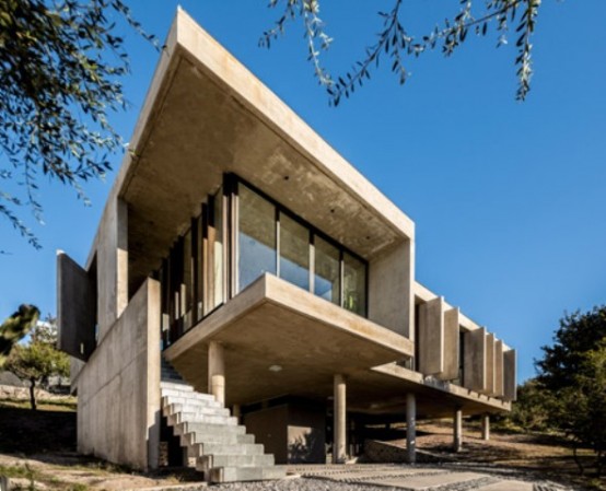 Raw Concrete House In La Rufina Elevated Above The Landscape