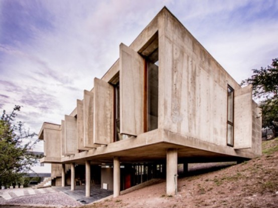 Raw Concrete House In La Rufina Elevated Above The Landscape