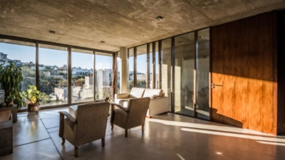 Raw Concrete House In La Rufina Elevated Above The Landscape