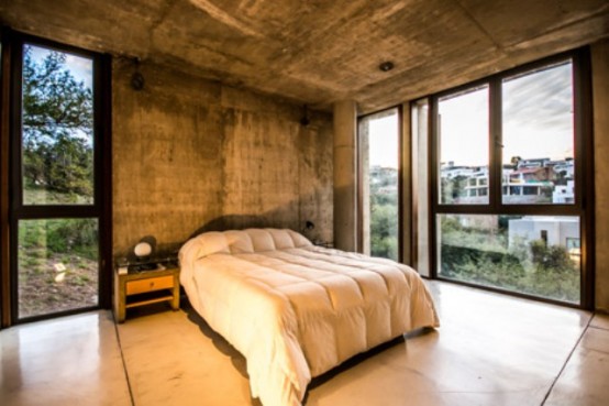 Raw Concrete House In La Rufina Elevated Above The Landscape