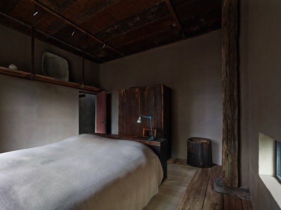 Raw Industrial Penthouse In Dark Earthy Shades