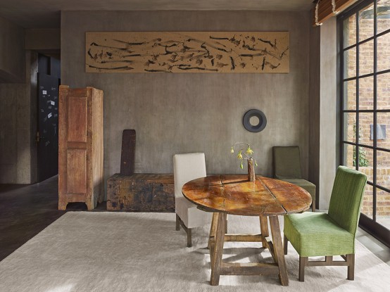 Raw Industrial Penthouse In Dark Earthy Shades