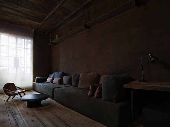 Raw Industrial Penthouse In Dark Earthy Shades