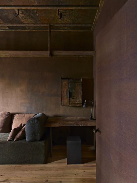 Raw Industrial Penthouse In Dark Earthy Shades