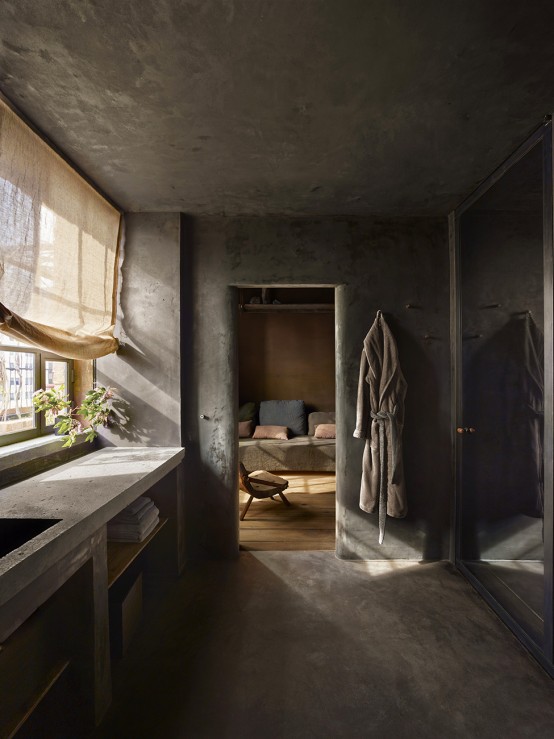Raw Industrial Penthouse In Dark Earthy Shades