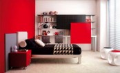 a black, red and white bedroom with open shelves, a bed with black and white bedding, stools and red nightstands