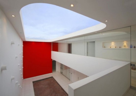 Red And White Modern Residence With Dramatic Architecture