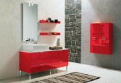 a contemporary bathroom done in grey and red, with bright furniture and lots of light- natural and not only
