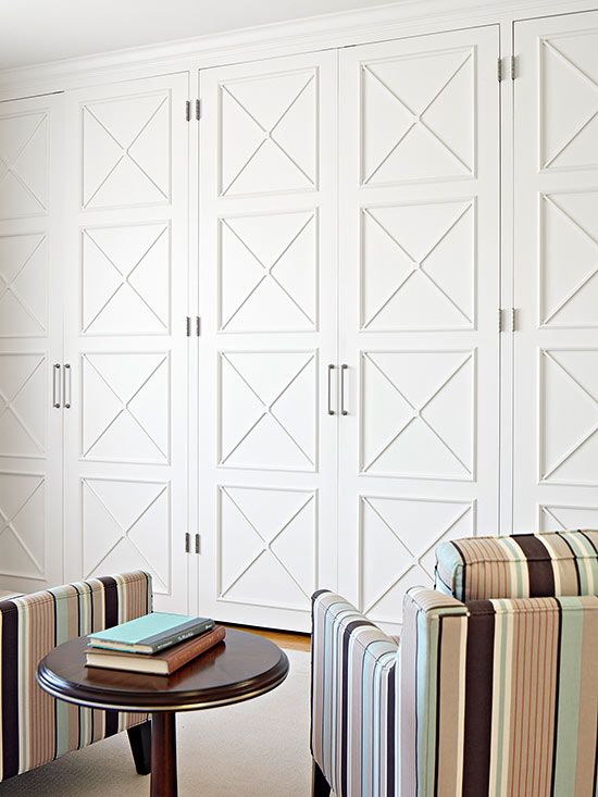 storage units with molded doors that add chic and a refined touch to the space, though they are still pretty neutral
