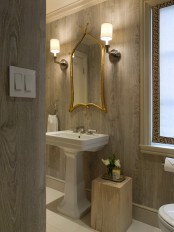 whitewashed wooden walls make this bathroom less formal and much cozier giving it a warm and cool feel